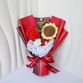 Detail of hand-knitted sunflower and red rose bouquet with Just For You ribbon wrap - Handmade Crochet Bouquet / Red