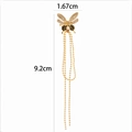Macro detail of gold butterfly ear cuff with sparkling zircon and long metal tassels - Butterfly Tassel Style (2#) / Gold Yellow