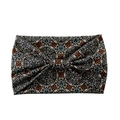 Elastic wide yoga headband featuring a geometric tribal pattern with a central knot detail - Tribal Style Geometric Pattern