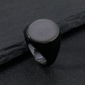 Polished matte black titanium steel signet ring for men on dark textured stone - US 6 / Ellipse / Black