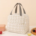 Isolierte Lunchtasche aus Tweed in Creme mit Goldglitzer und gestreiftem Griff - Cremeweiß