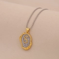 Macro detail of gold two-tone pendant necklace with sparkling letter S and silver beads - Letter S