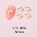 Macro view of gold heart hollow nail art charms with rose detail and 8x7mm size - Side Rose Hollow Heart (A007) / 10 Pieces Pack / Gold