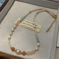 Handmade necklace with baroque pearls and pink rose stones in a beige jewelry box - Natural Shoushan Stone Pearl Necklace