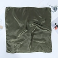 Detailed close-up of dark green silk square scarf fabric showing smooth glossy texture - Army Green