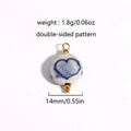 Detail view of a 14mm ceramic bead with blue heart pattern and 18K gold plating - Blue Heart (Style 2)