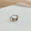 Adjustable silver bow ring with sparkling diamond inlay and elegant metal finish - Silver Bow Micro-inlaid Open Ring (J2968)