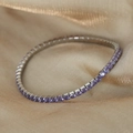 Tennis bracelet in silver finish featuring rows of purple cubic zirconia stones - Steel Color/Purple Zircon