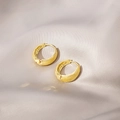 Elegant gold round hoop earrings with textured finish on white silk background - Gold Textured Grain Vintage Hoop Earrings