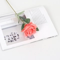 Artificial coral pink velvet rose flower on magazine for home and wedding decor - Silk Orange