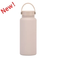 Matte beige 1L stainless steel water bottle with a portable handle lid for outdoor - Milk Tea