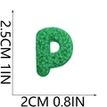 Macro detail of 2.5cm green chenille alphabet P patch with fluffy towel embroidery texture - Letter-P