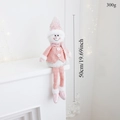 Pink plush snowman decoration sitting on fireplace, measures 50cm tall and weighs 300g - Pink Long Legged Snowman