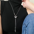 Silver butterfly necklace with long fringe tassels and metallic beads on black sweater - No.19 Butterfly Tassel Style / Silver