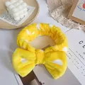Yellow polka dot plush headband with a large bow for washing face or makeup routine - Yellow White Polka Dot