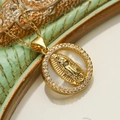 Macro detail of gold-plated Virgin Mary pendant with mother of pearl and cubic zirconia - Round Mother of Pearl Zircon Virgin Mary