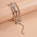 Mehrlagiges silbernes Boho-Armband mit hellblauen Perlen und geometrischen Anhängern - Silber-Blau