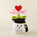 Handmade crochet graduation flower with pink petals and black doctoral hat 2025 gift - White Pot Graduation Cap Preserved Flower