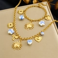 Golden necklace and bracelet set with sun face, heart charms and blue floral ceramic beads - Necklace & Bracelet Set(N3646 B1805)