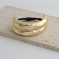 Minimalist gold metal hair tie with hammered texture for elegant ponytail styling - Gold Textured Wide Hair Rope
