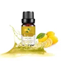 10ml pure lemon essential oil in amber glass bottle with fresh lemon and splash effect - Lemon (single Ingredient)