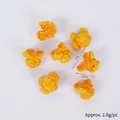 Set of 7 realistic resin popcorn kernels for DIY crafts measuring 2cm by 1.5cm each - Dark Color Popcorn