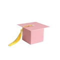 Detailed view of a pink graduation cap gift box with a decorative yellow tassel - Pink Bachelor Cap Box