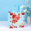 Light blue Mother's Day non-woven gift bag with red rose pattern and gold lettering - Light Blue Style 1