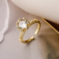 Gold plated open ring featuring a crown-set white zircon and micro-pave accents - Adjustable Open / Gold