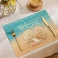 Linen placemat with beach starfish and shells design featuring Welcome text - Welcome Starfish Shells