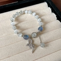 Elegant beaded bracelet with white opal effect stones and silver snake pendant charm - Silver-Cross-Snake