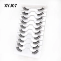 Macro shot of 10 pairs of black cat eye eyelashes model XYJ07 on a professional white tray - Curled Voluminous Style (XYJ07) / 10 Pairs Set