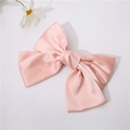 Detail of pink satin bow hair clip with soft silk texture on white minimalist background - Light Pink