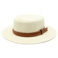 Detail of cream woven straw boater hat featuring a brown faux leather decorative band - Cream