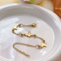 Elegante collana in acciaio al titanio placcato oro 18K con tre ciondoli a farfalla 3D - Bracciale a Farfalla Coordinato