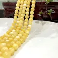 Polished pale yellow tiger eye beads for DIY jewelry making with waxy luster finish - Beige Jade Ab41 / 6mm / Approx 63pcs