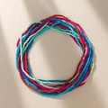 Bohemian multilayer colorful seed bead body chain featuring vibrant glass beads on stone - Red Blue & Green Mix