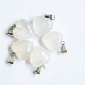 Five pieces of white translucent heart-shaped natural stone pendants with silver clasps - Agate