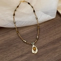 Vintage necklace with brown tiger eye beads and water-drop golden pendant on wood - 1# Necklace