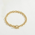 Detalle del collar con ondas doradas con cierre de palanca OT y anillos de textura martillada - Pulsera de Hebilla OT