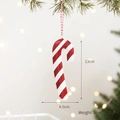 Christmas metal candy cane ornament with red and white stripes hanging on a tree - Iron Candy Cane
