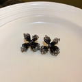 Cross petal stud earrings with black and grey crystals on a ceramic display tray - 4# Silver Earring Post-Black