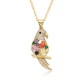 Detail showing a gold parrot pendant with colorful gemstones and white cubic zirconia - Parrot