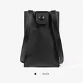 Minimalist black phone crossbody bag in lychee pattern faux leather with shoulder strap - Black