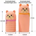 Collapsible orange Shiba Inu silicone pencil case showing retracted and extended heights - Dog Straight