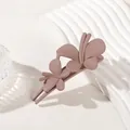 Detailed view of 3D butterfly matte hair claw clip in elegant dusty rose brown color - Double Butterfly Clip - Matte Milk Coffee