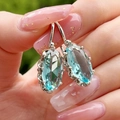Pendientes vintage con grandes piedras preciosas azules ovaladas y ganchos de plata - E4625 Azul Cielo / Base Plateada