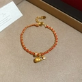 Detalle de pulsera de cadena dorada trenzada roja con dije de calabaza y colgante corazón - Estilo de Calabaza y Corazón (1#) / Rojo/Dorado