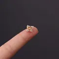 Star-shaped golden stainless steel cartilage stud earring with cubic zirconia stones - Zircon Four-Pointed Star (HSPJ356-11#G)