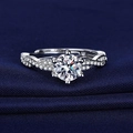 Elegant silver ring with a round central stone and pave-set twisted band detail - White Gold Ljz-245 / Adjustable Open